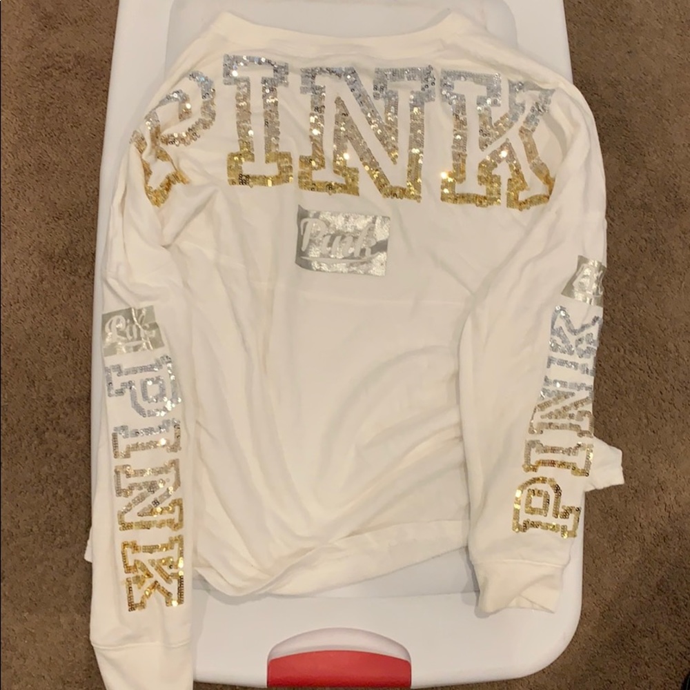 White long sleeve blouse by PINK with sequins.